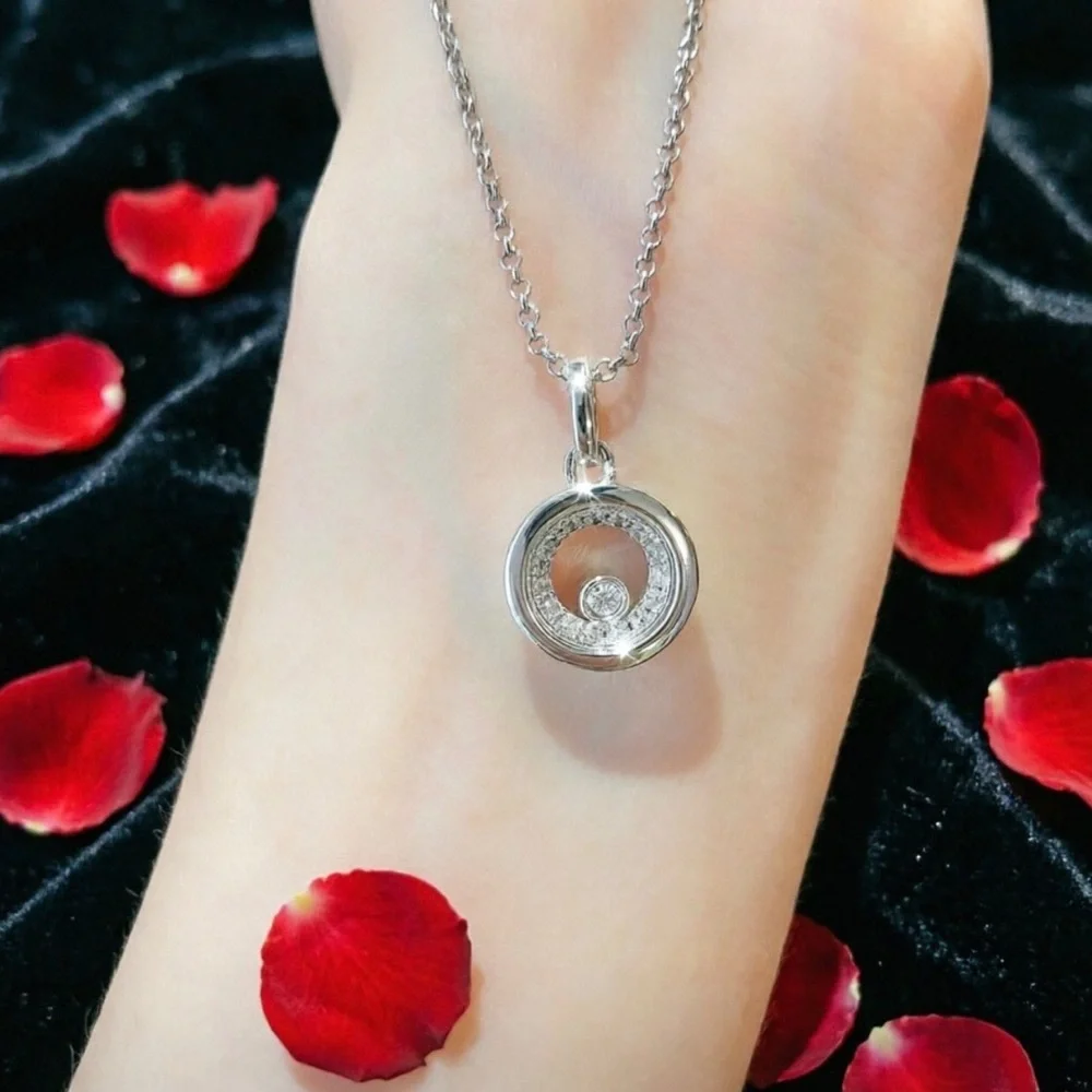 Chopard Silver Disk Necklace with Clear Diamond and Peach Accents